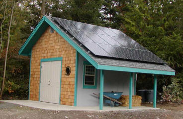 3 kW on tool shed roof in Sequim Bay area built specifically as a platform for the solar array.  The power from this system is transferred to the nearby home’s service panel.  We have trenched power in this manner up to 300 ft.
